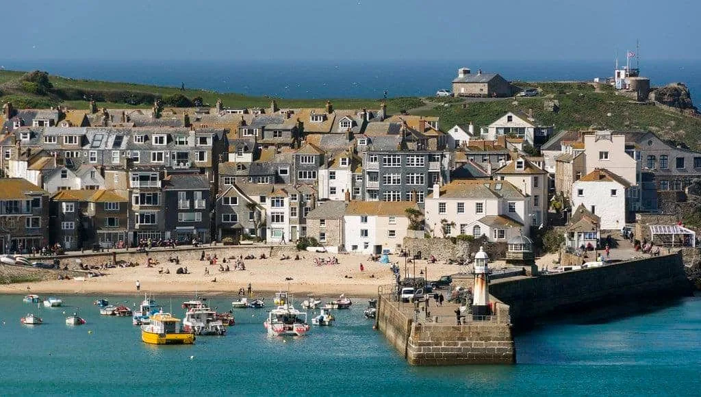 St Ives harbour - cottages and boats on turquoise water