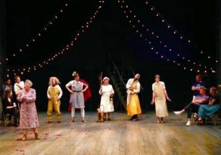 Actors performing on stage for the show SHAKESPEARE NATION: COMEDY OF ERRORS