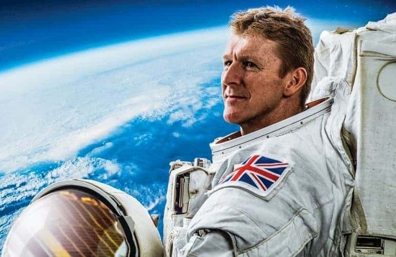 Astronaut Tim Peake with earth as his background