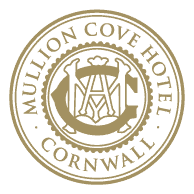 Mullion Cove Hotel Cornwall emblem with anchor and shield.